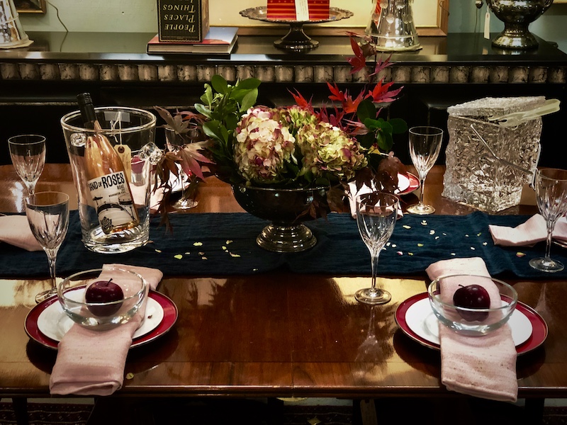 Diane uses deep, dark, rich blue teal runner and deep jewel tones on this luxurious tablescape